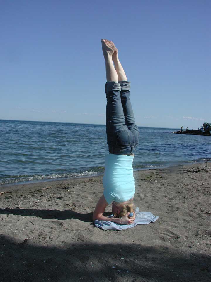 headstand at beach